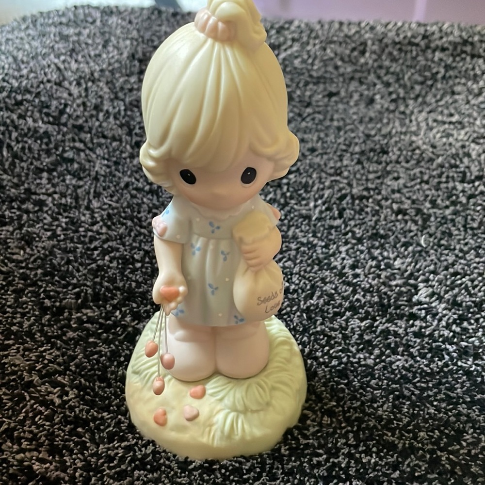 Precious Moments “sow love to grow love” figurine